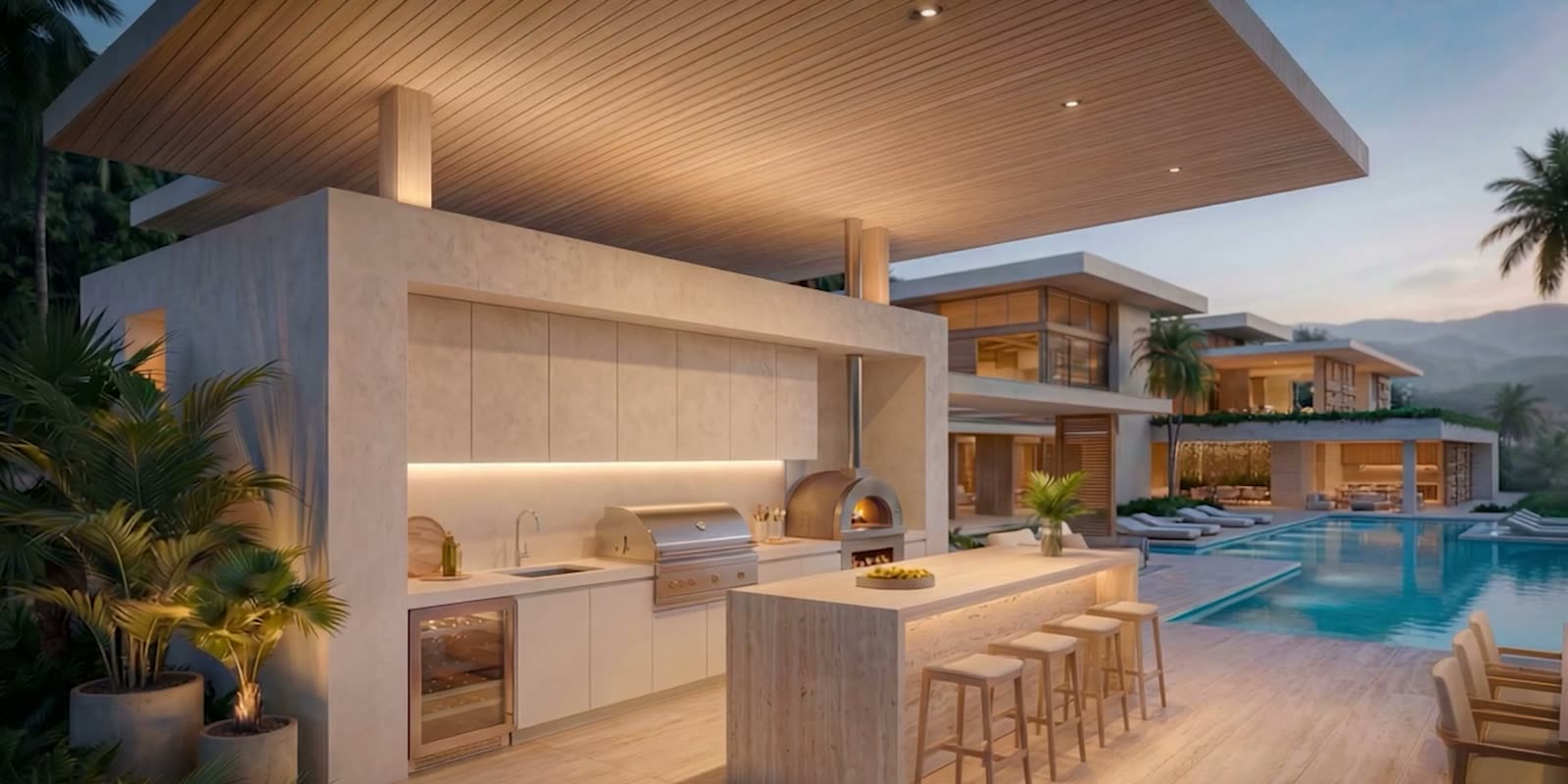 Rendered outdoor kitchen with a stone island and bar stools beside the pool at sunset